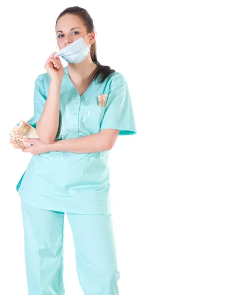 Female surgeon doctor holding money — Stock Photo, Image