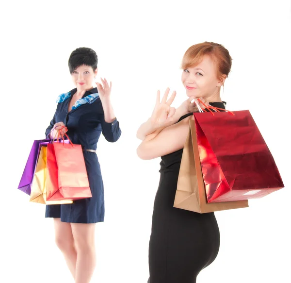 쇼핑백과 우아한 두 여자의 초상화 — 스톡 사진