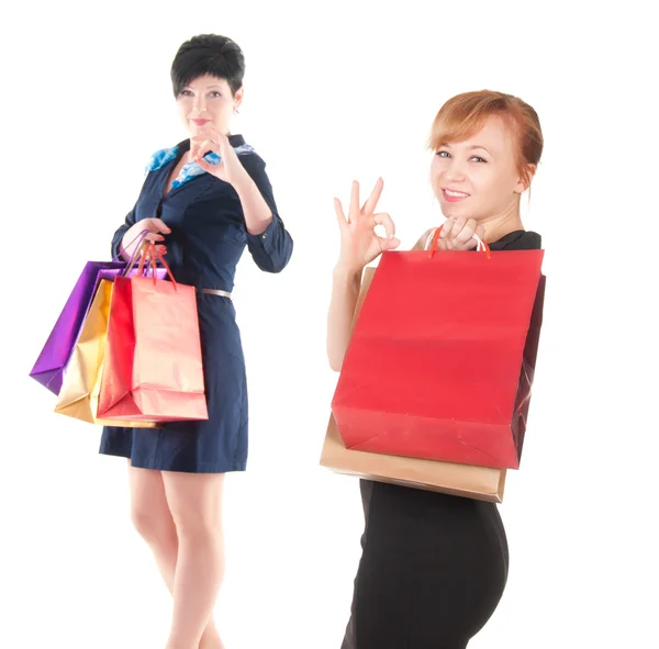 Portrait of elegant two women with shopping bags — Stock Photo, Image