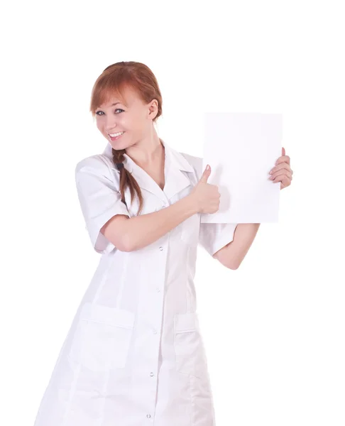 Young woman doctor is holding blank paper. — Stock Photo, Image