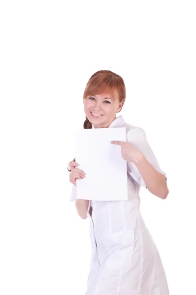 Young woman doctor is holding blank paper. — Stock Photo, Image