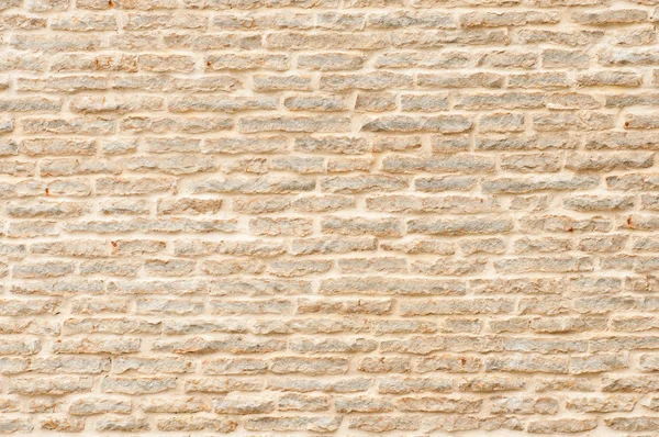 Oude bakstenen muur in een achtergrond afbeelding — Stockfoto