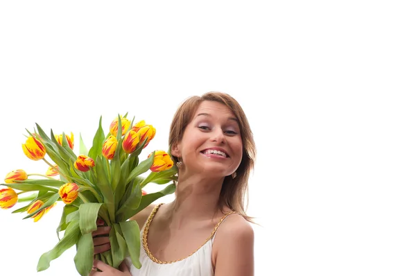 Bella donna bionda con bouquet di tulipani — Foto Stock