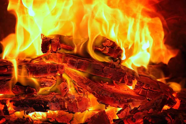 オーブンで熱くて赤い薪 ストック画像