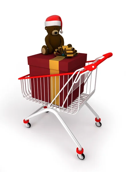 A shopping cart with a big gift box and christmas teddy bear — Stock Photo, Image