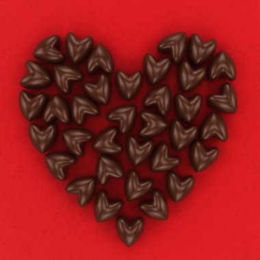 Kırmızı kadife zemin üzerine çikolata şeker Kalpler
