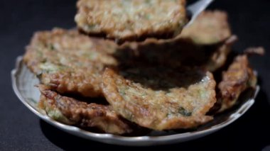 Vegetable pancakes from zucchini just baked closeup. Shallow depth of field
