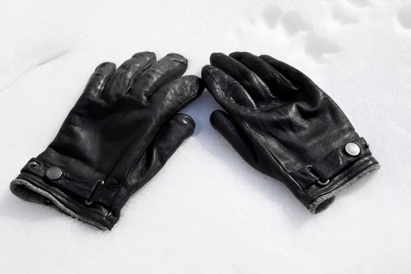 Guantes en la nieve Fotos De Stock