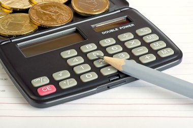 hesap makinesi, sikke ve kalem