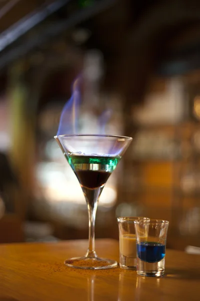 Burning cocktail on a table — Stock Photo, Image