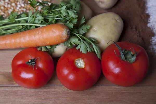 Fresh vegetables on a wooden table — Stock Photo, Image