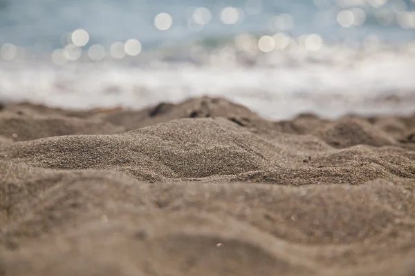 Bakgrund av sand och hav — Stockfoto