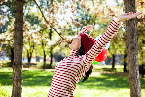 Beautiful girl and balloons — Stock Photo, Image