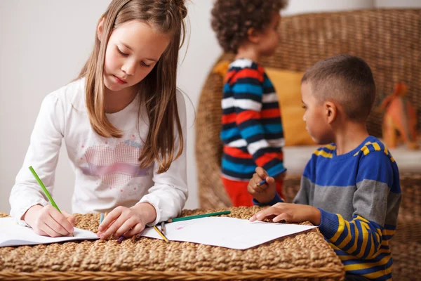 Mixed race kids drawing — Stock Photo, Image