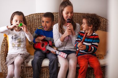 Kids playing musical instruments clipart