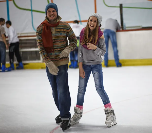 Vintersport, far och dotter Stockfoto