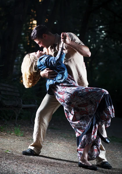 Caucasian  man and woman in nature,at night — Stock Photo, Image