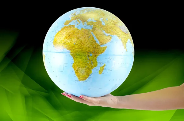 Dünya globus elinde, çeşitli arka plan — Stok fotoğraf