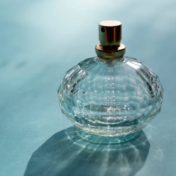 Square Format Photo Illuminated Bottle Perfume Made Glass Flowery Scent — стоковое фото