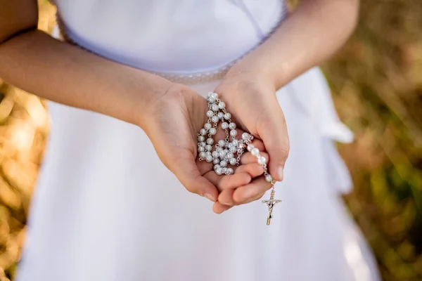 First communion, rosary. First Holy Communion concept.