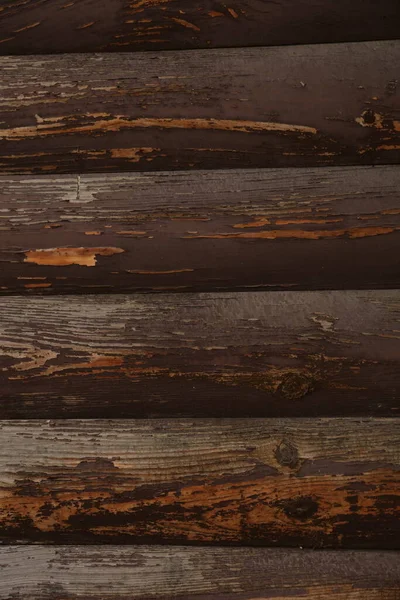 Koyu kahverengi boyalı eski tahtalar. — Stok fotoğraf
