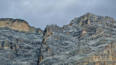 Val Badia, Italy-July 18, 2022: The italian Dolomites behind the small village of Corvara in summer days with beaitiful blue sky in the background. Green nature in the middle of the rocks.