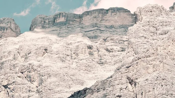 Val Badia, Italy-July 18, 2022: The italian Dolomites behind the small village of Corvara in summer days with beaitiful blue sky in the background. Green nature in the middle of the rocks.