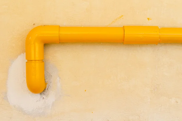 Yellow plastic pipes for background — Stock Photo, Image