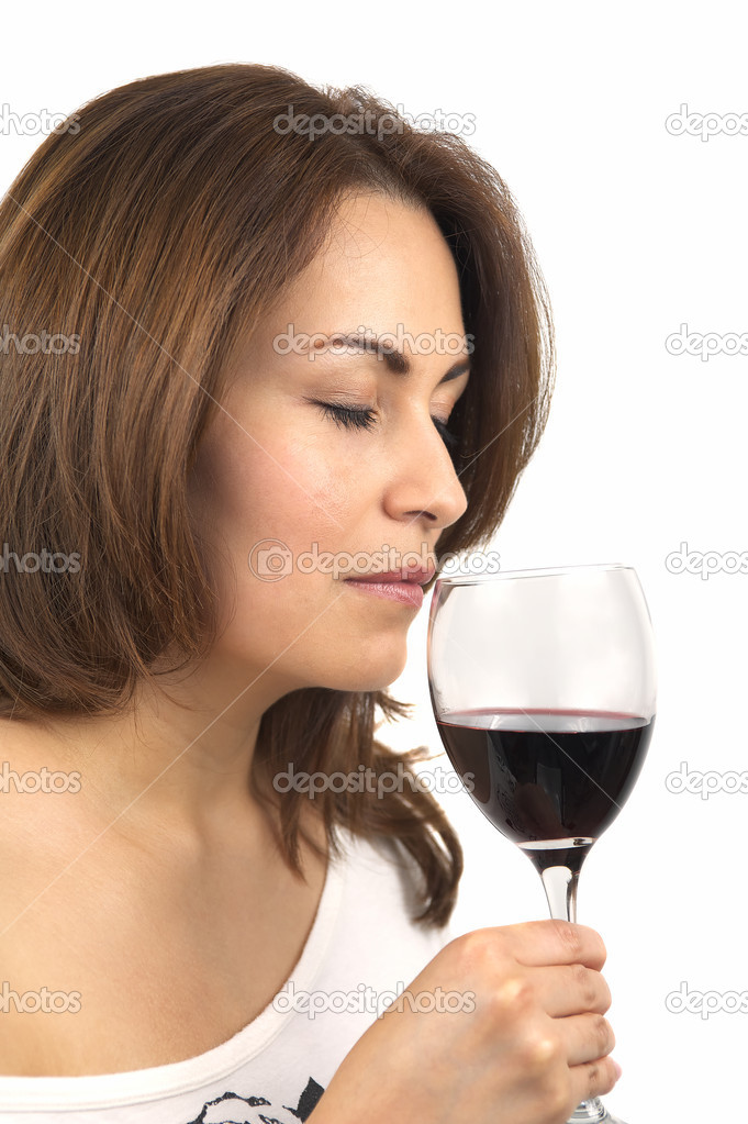 Woman testing red wine