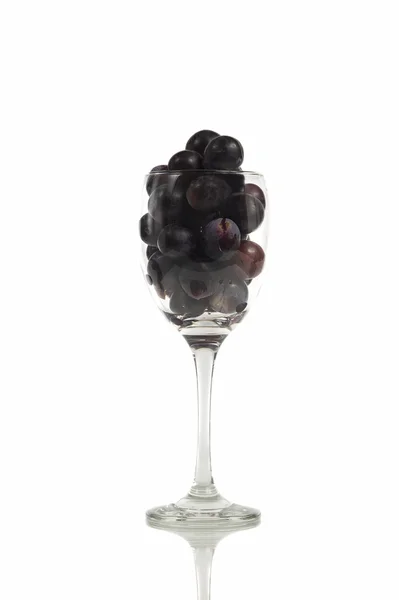Niekliknięty czerwone wino w szklance — Zdjęcie stockowe