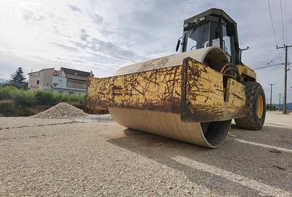 large old roller on gravel road close up