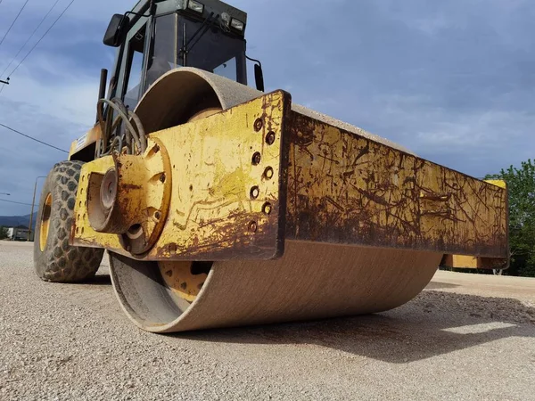 large old roller on gravel road close up