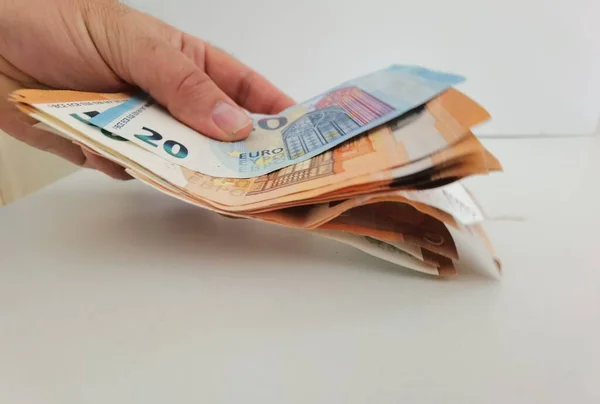 Mano Denaro Euro Pile Banconote Sfondo Bianco — Foto Stock