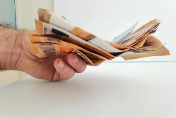 Hand Gives Money Euros Pile Banknotes White Background —  Fotos de Stock