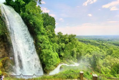 edessa waterfalls in spring season among green  platanus trees in greece