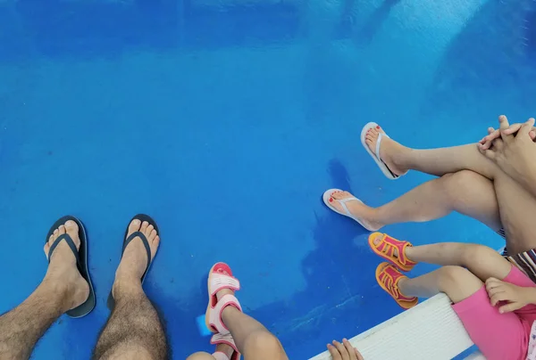 foot sandals family on the ship traveling for holidays  father mother children