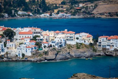 andros island capital called andros houses lighthouse sea greece agean sea