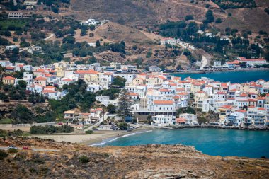 andros island capital called andros houses lighthouse sea greece agean sea