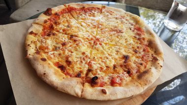 pizza baked top view on the table hot