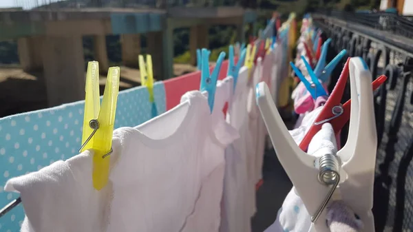 pegs laundry clothes drying by the sun  energy saving way