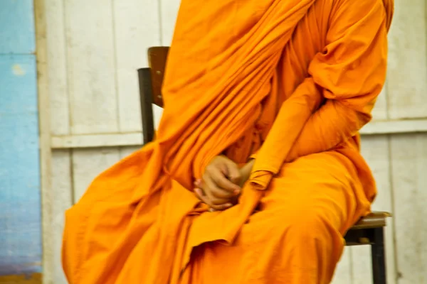 Mnich ręka siedzący — Zdjęcie stockowe