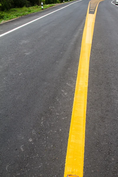 Yellow line on the road texture background — Stock Photo, Image