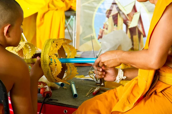 Buddhist making a candle — Stock Photo, Image