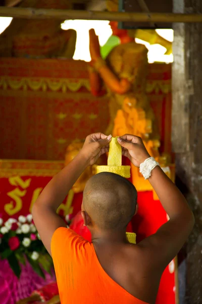 Buddhist making a candle — Stock Photo, Image
