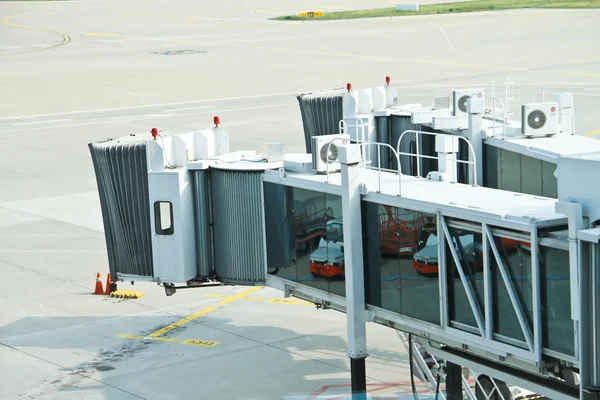 Aerobridge in plane parked — Stock Photo, Image