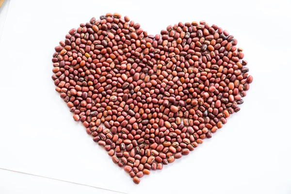 Heart of red beans on a white background — Stock Photo, Image