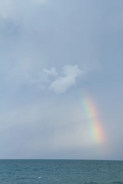 Rainbow over ocean — Stock Photo, Image