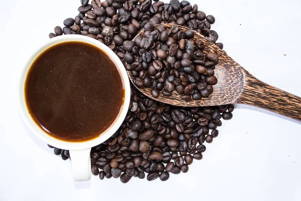 一杯のコーヒーとスタックの種子 ストック画像
