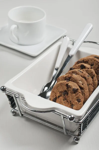 Side closeup view of biscuits in white plate — Stock Photo, Image