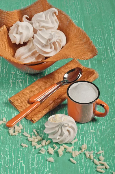 Top view of meringues and orange cup — Stock Photo, Image